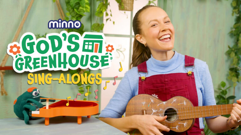 Smiling woman in red overalls plays a wooden guitar in a bright green setting with 'God's Greenhouse Sing-Alongs' text in the foreground.